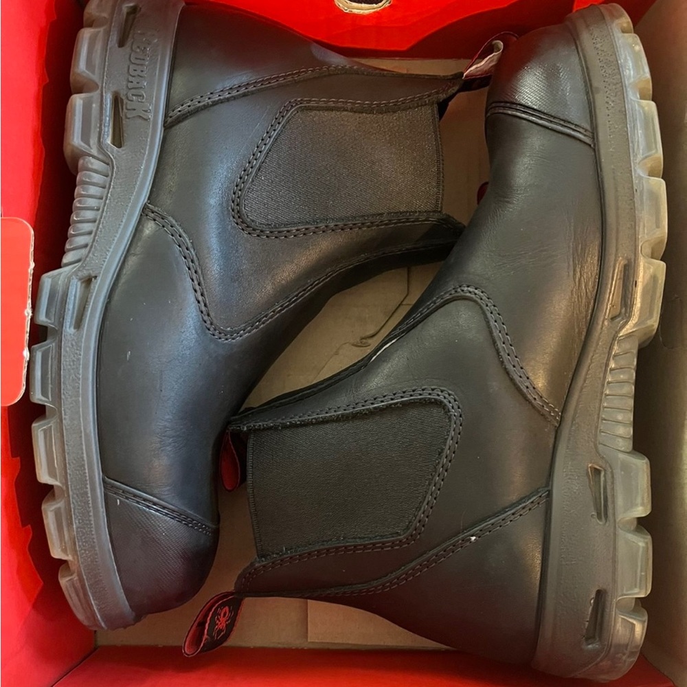Redback easy slip on boots. Steal toe version with leather tow cap.